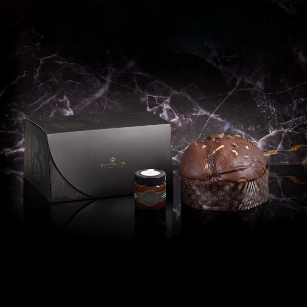 Panettone with dark chocolate and gold MODICA CHOCOLATE CREAM We accompany our panettone with the famous chocolate cream of modica. In fact, we get a really special panettone Format: 200 gr Place of origin: Sicily